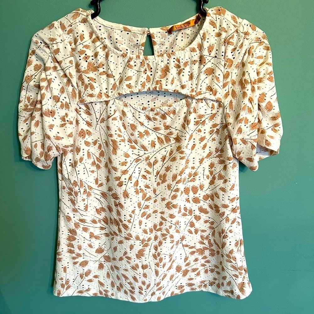 Belldini size small shirt with keyhole/slit in front.